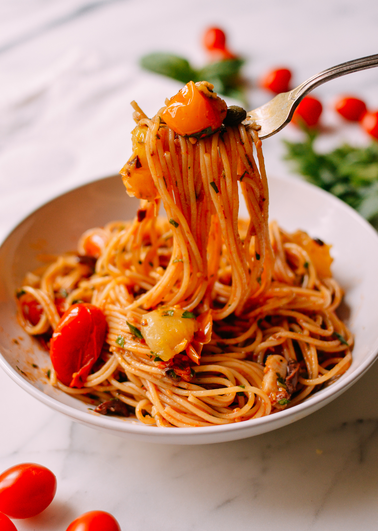 Forkful of Spaghetti with Roasted Cherry Tomato Puttanesca Sauce