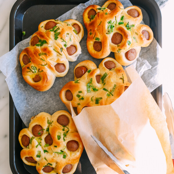 Chinese flower hot dog buns on tray