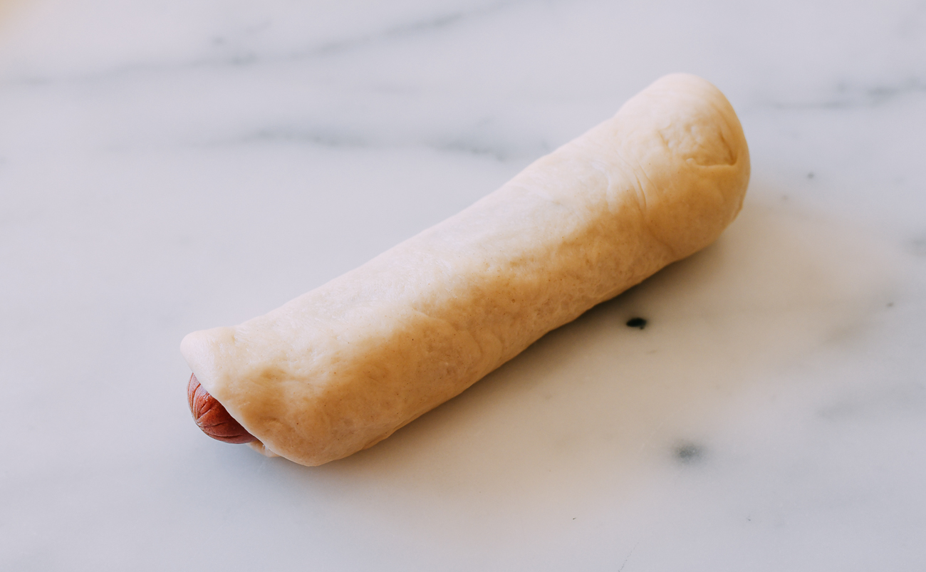 hot dog rolled in milk bread dough