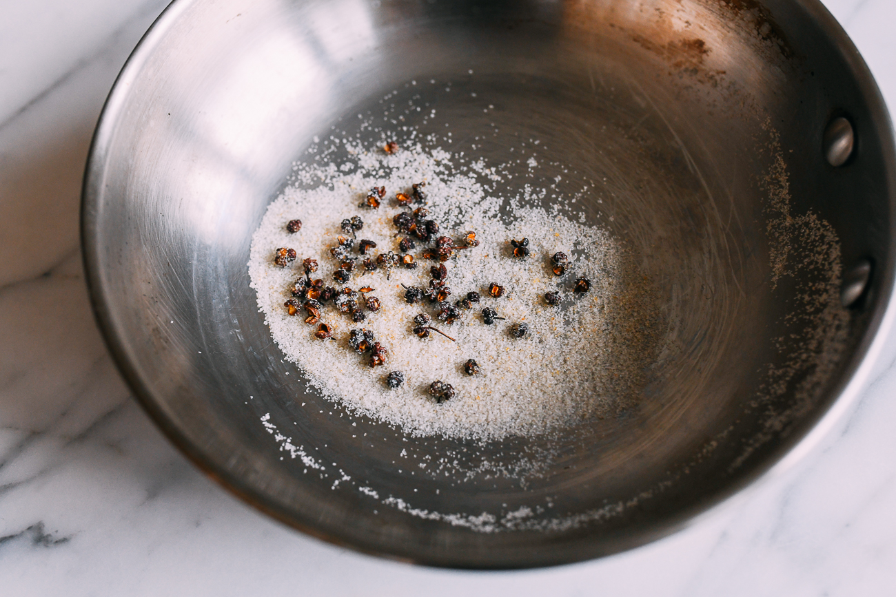 Cooked salt and Sichuan peppercorns in pan
