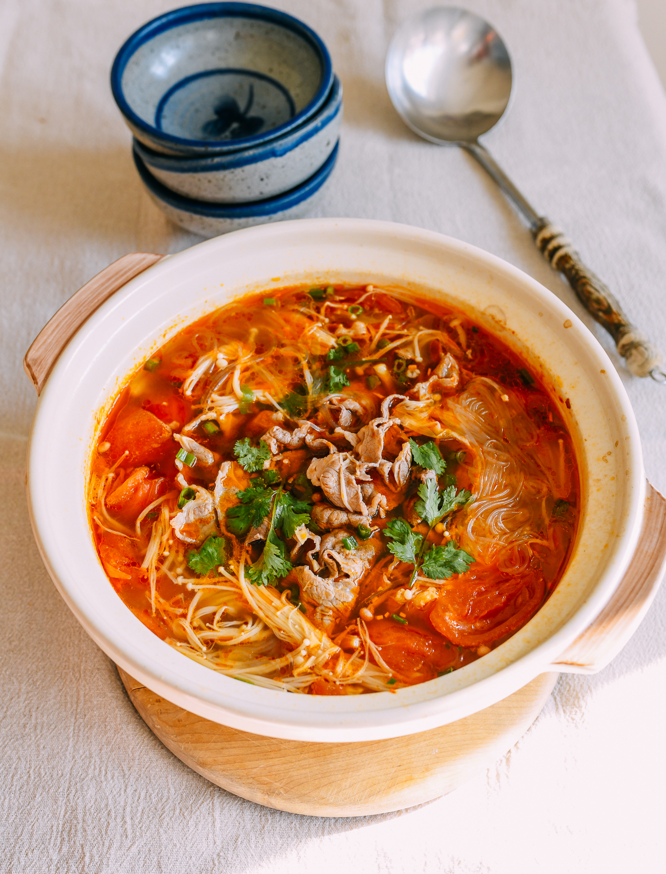 Chinese Tomato Beef Hot Pot with Enoki Mushrooms and Glass Noodles