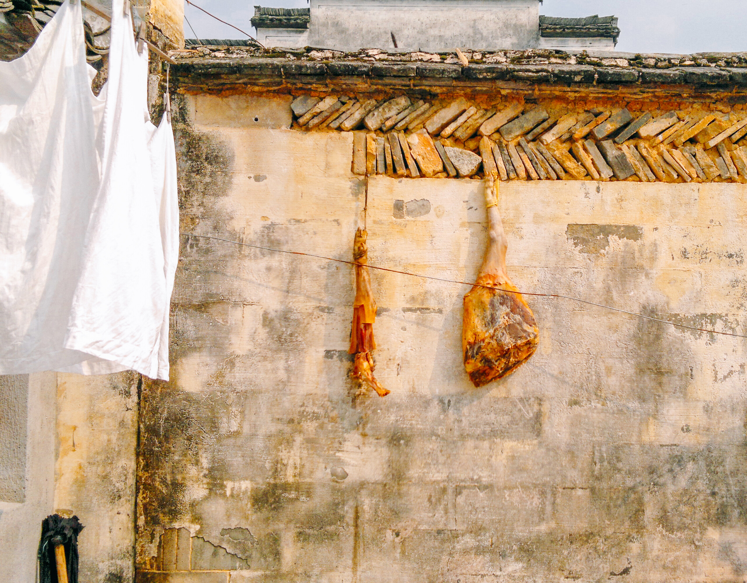 Ham hanging in Chinese home courtyard