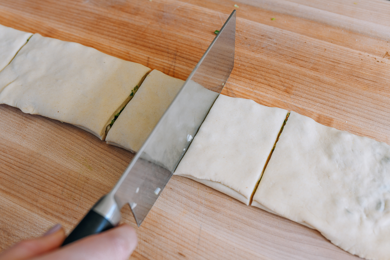 cutting dough into strips