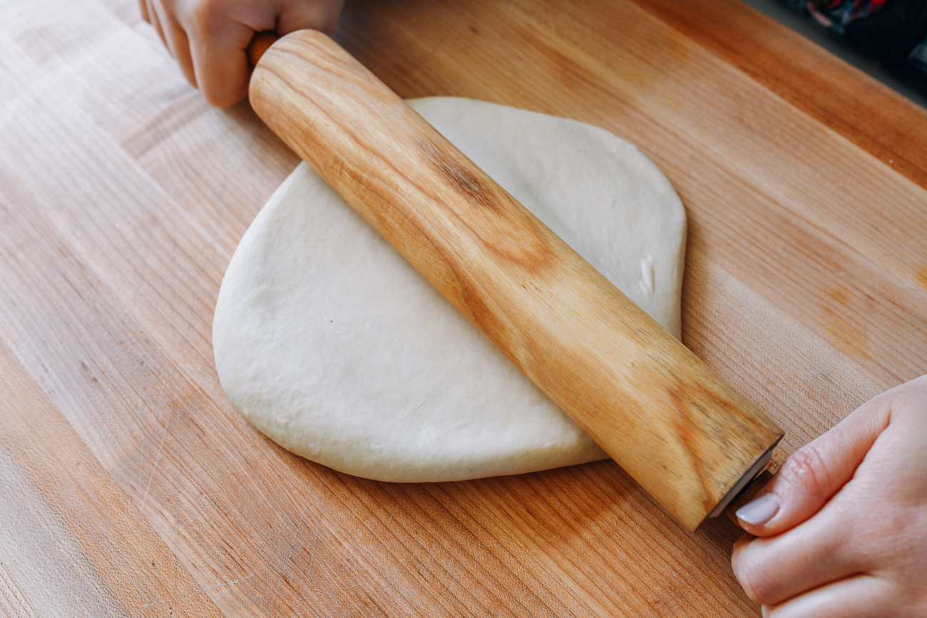rolling dough on cutting board