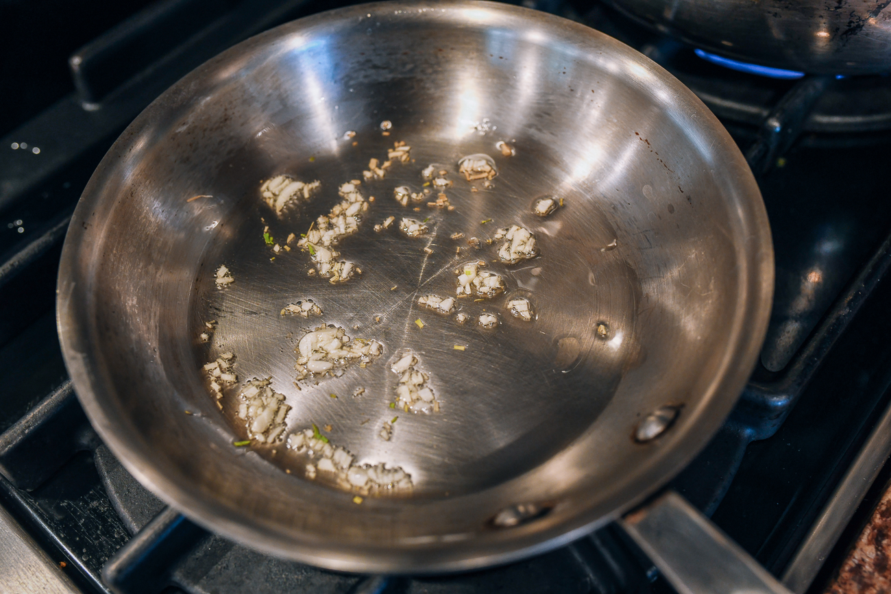 cooking garlic in small pan