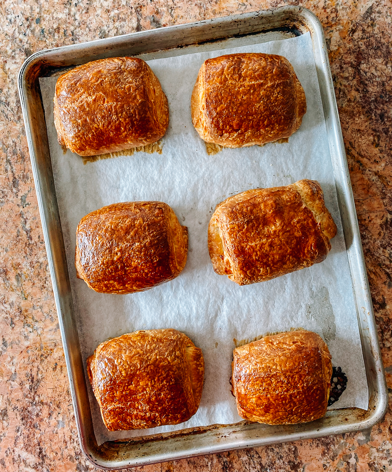 baked croissants on sheet pan