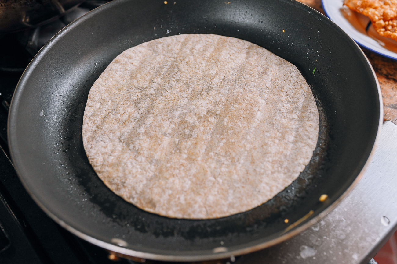 frying whole wheat tortilla in nonstick pan