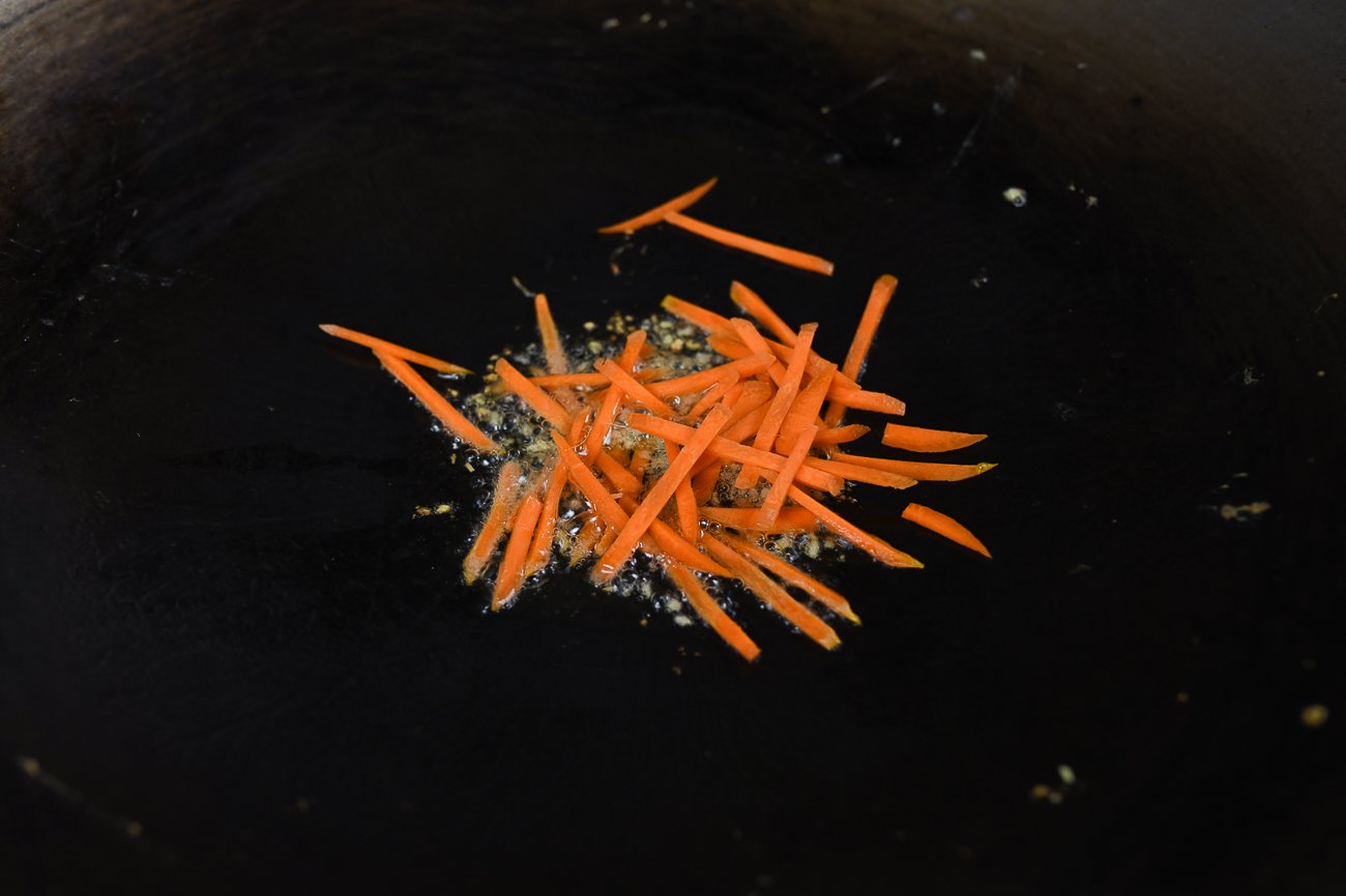 carrots and ginger in wok