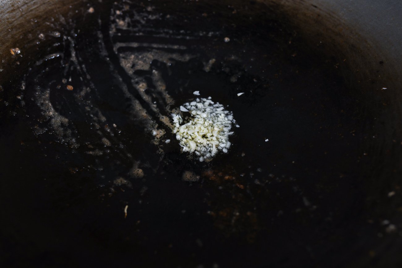 chopped garlic in wok