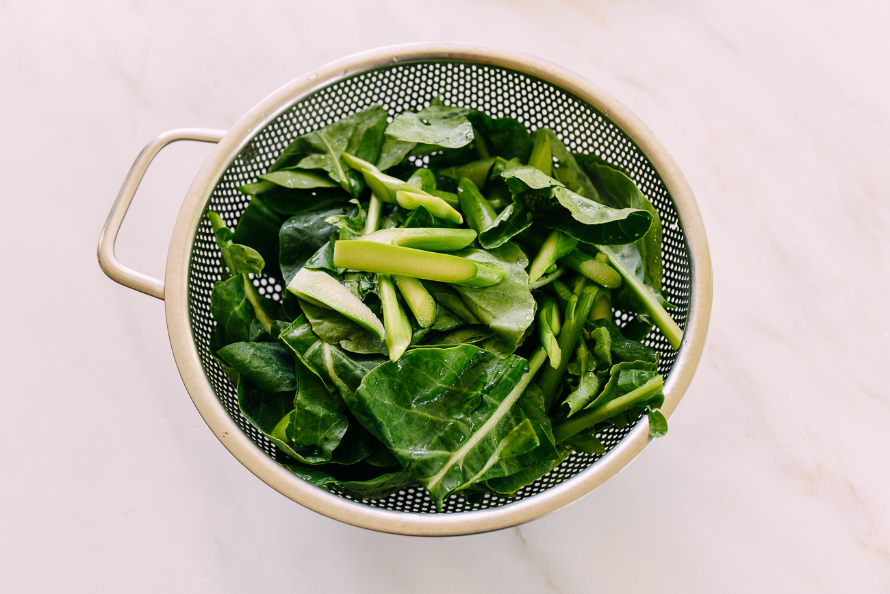 Chinese broccoli in colander