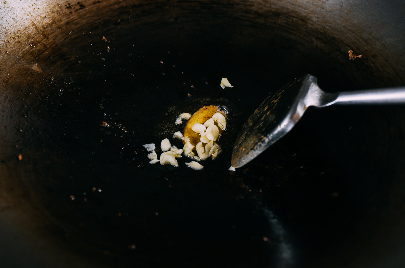 cooking ginger and garlic in wok