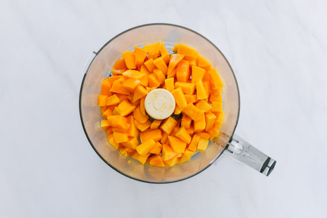mango cubes in food processor bowl