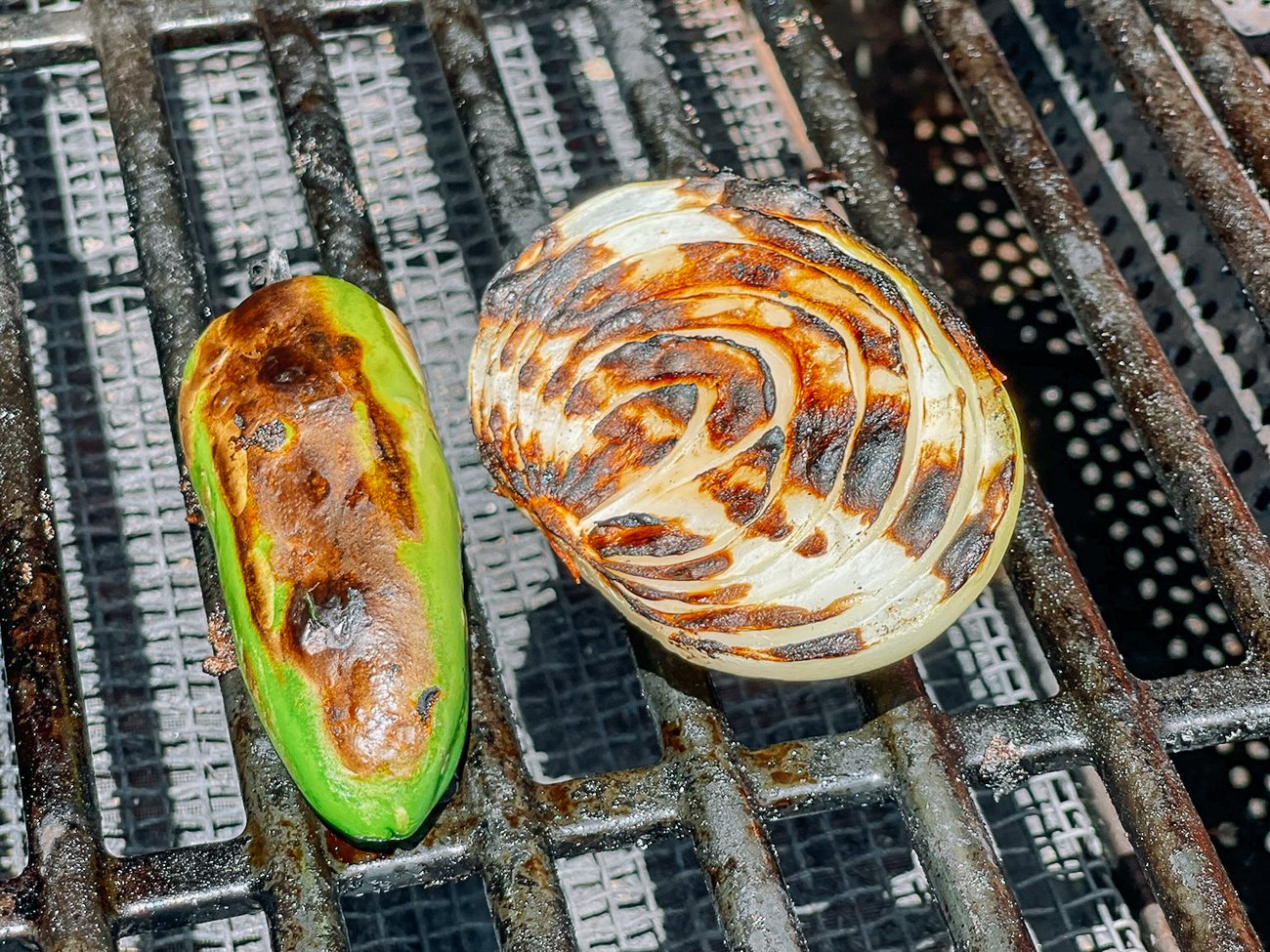 charred jalapeno and onion on grill