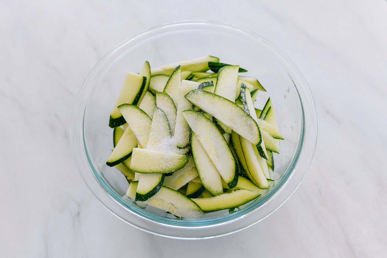 zucchini slices with salt on top