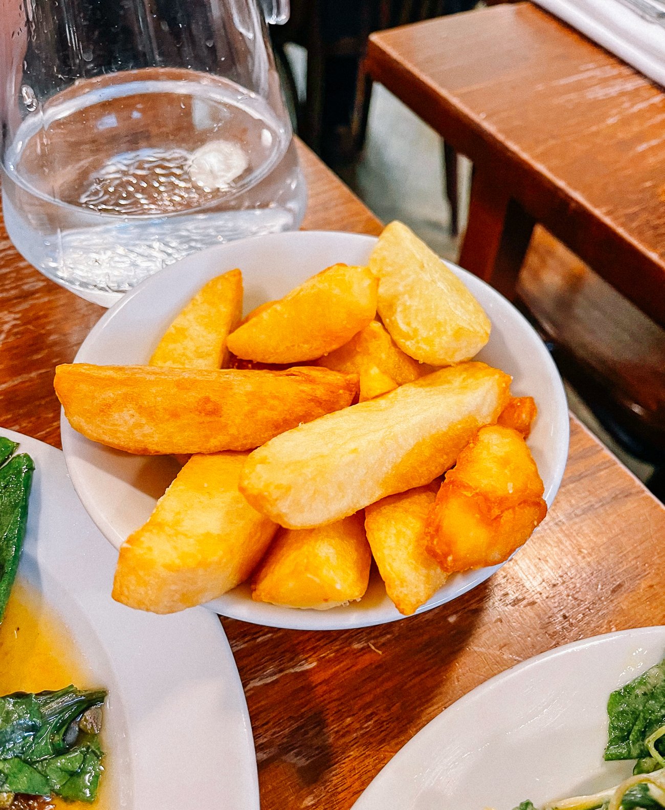 a bowl of golden, thick-cut chips