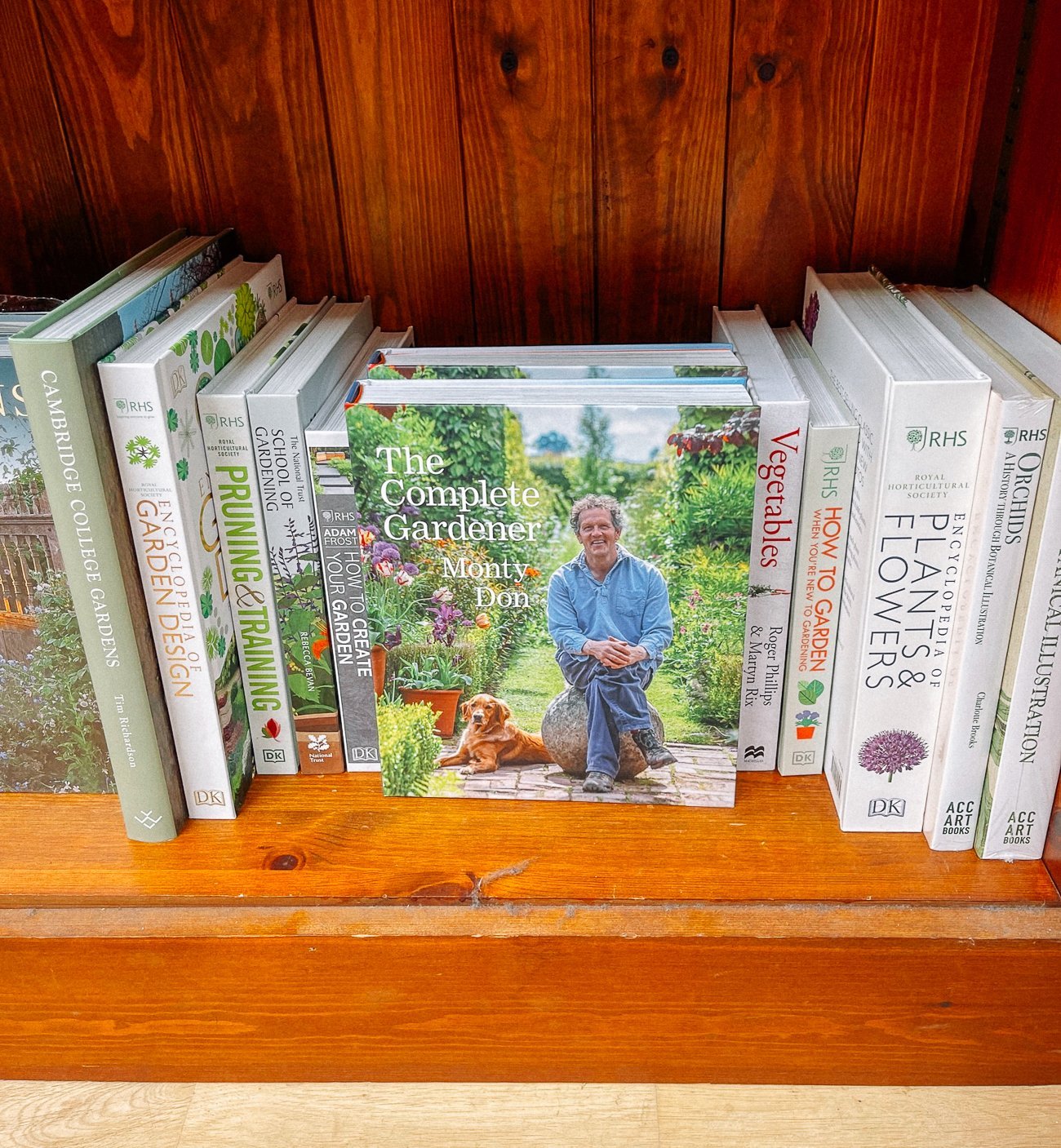 Monty Don's gardening book on a shelf
