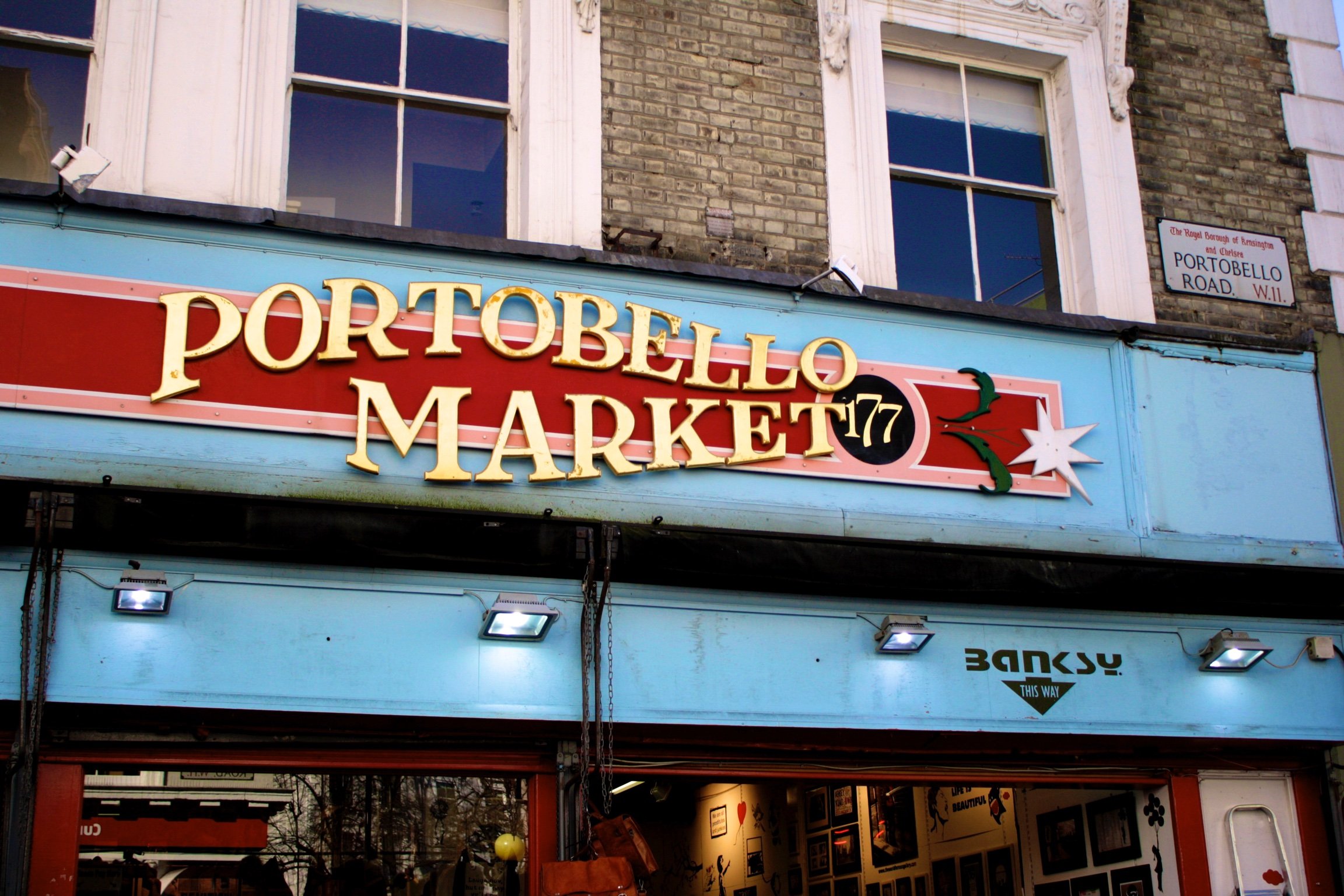 Portobello Market sign in red, blue, pink and gold