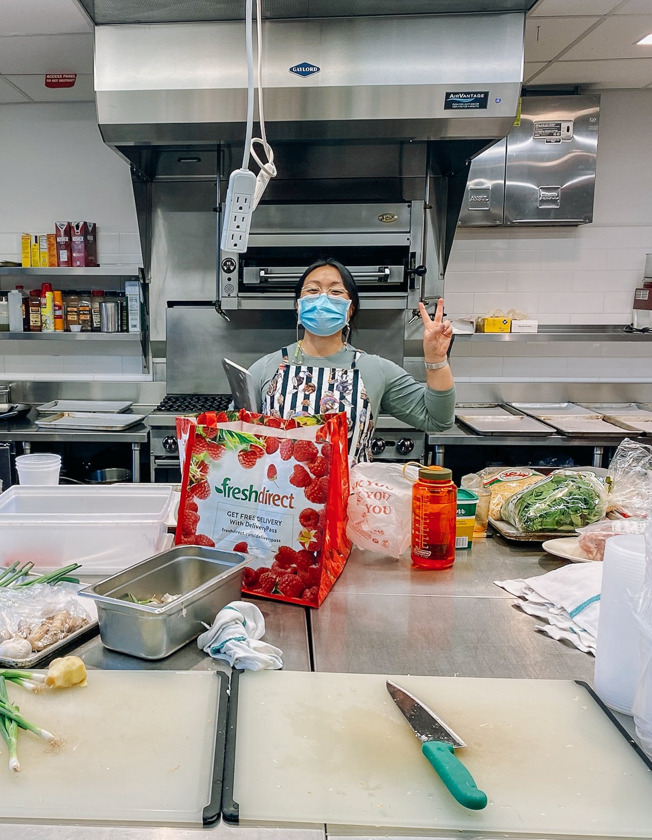 Kaitlin prepping mise en place for cooking class