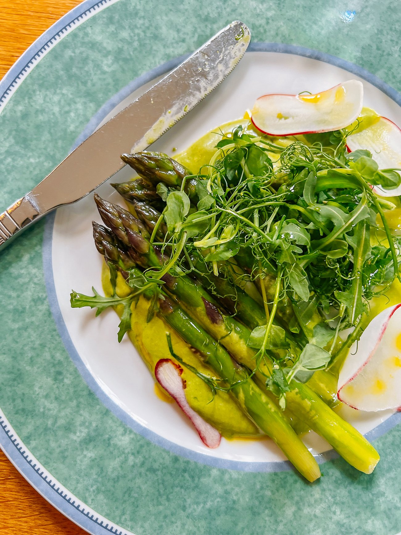Asparagus and watercress mayo with frilly salad leaves and radish slices