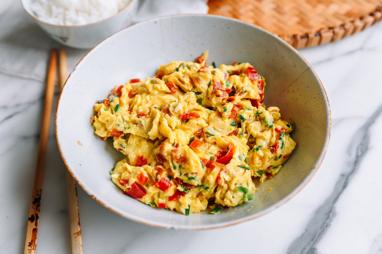 bowl of Chinese-style scrambled eggs with chili and chive