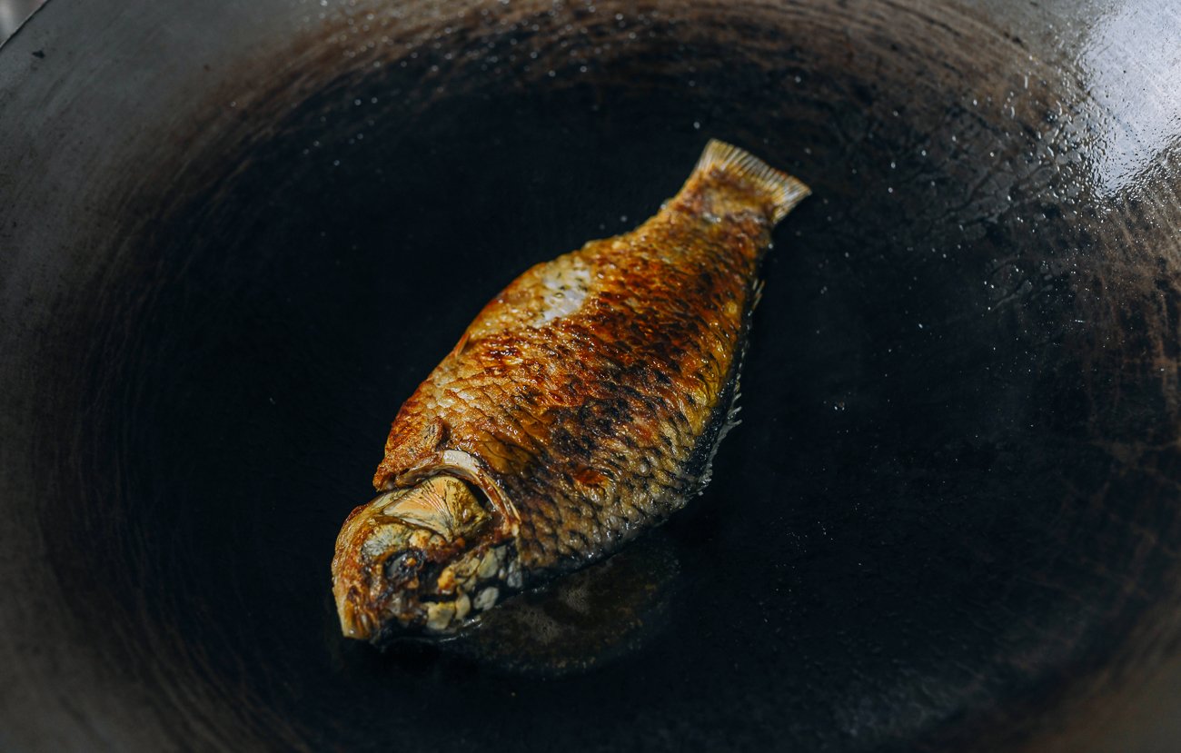 pan-fried carp in wok