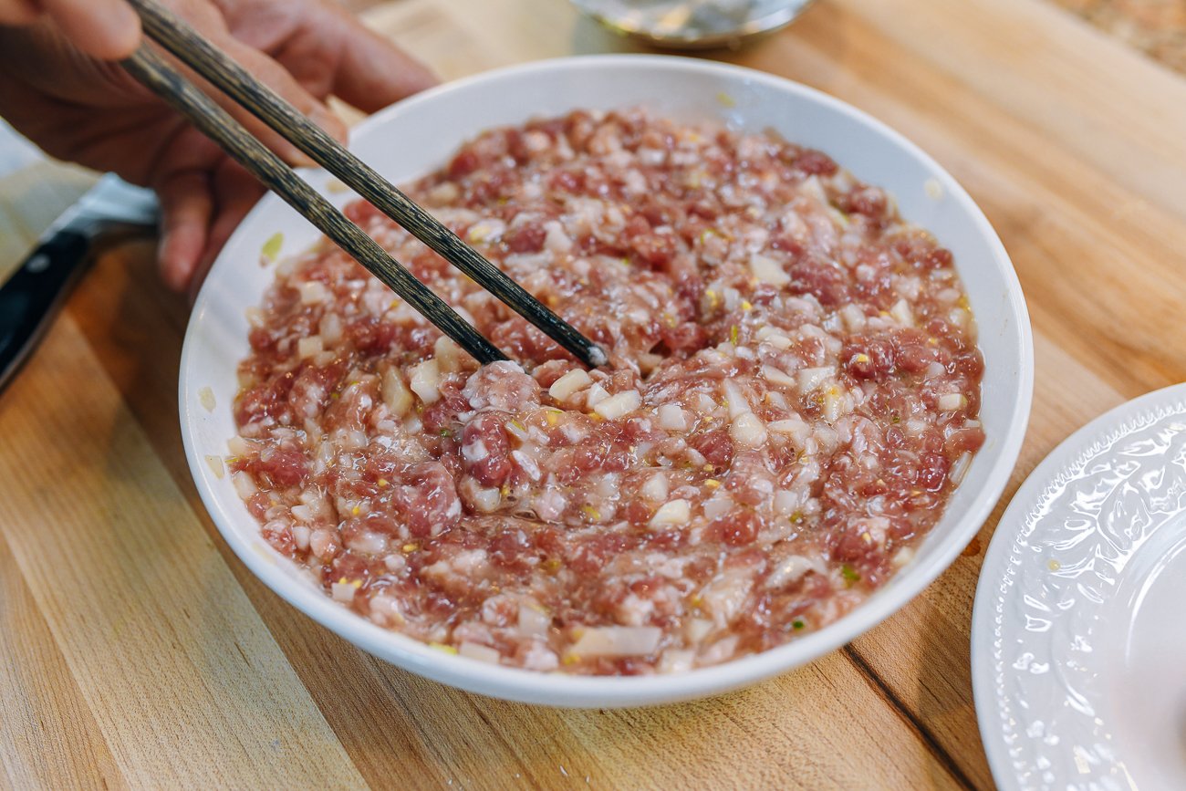 mixing ground pork and water chestnuts