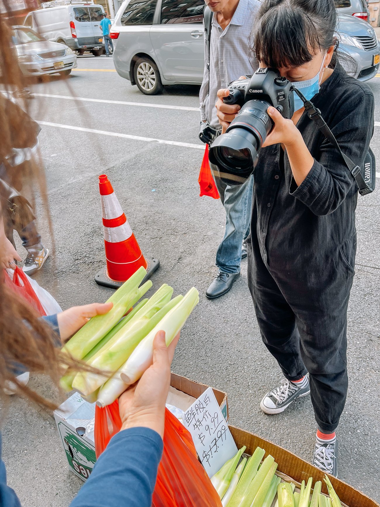Christine photographing jiaobai in Chinatown