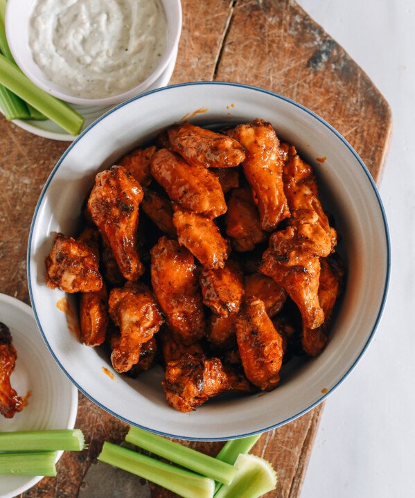 air fryer buffalo wings with blue cheese dressing and celery sticks