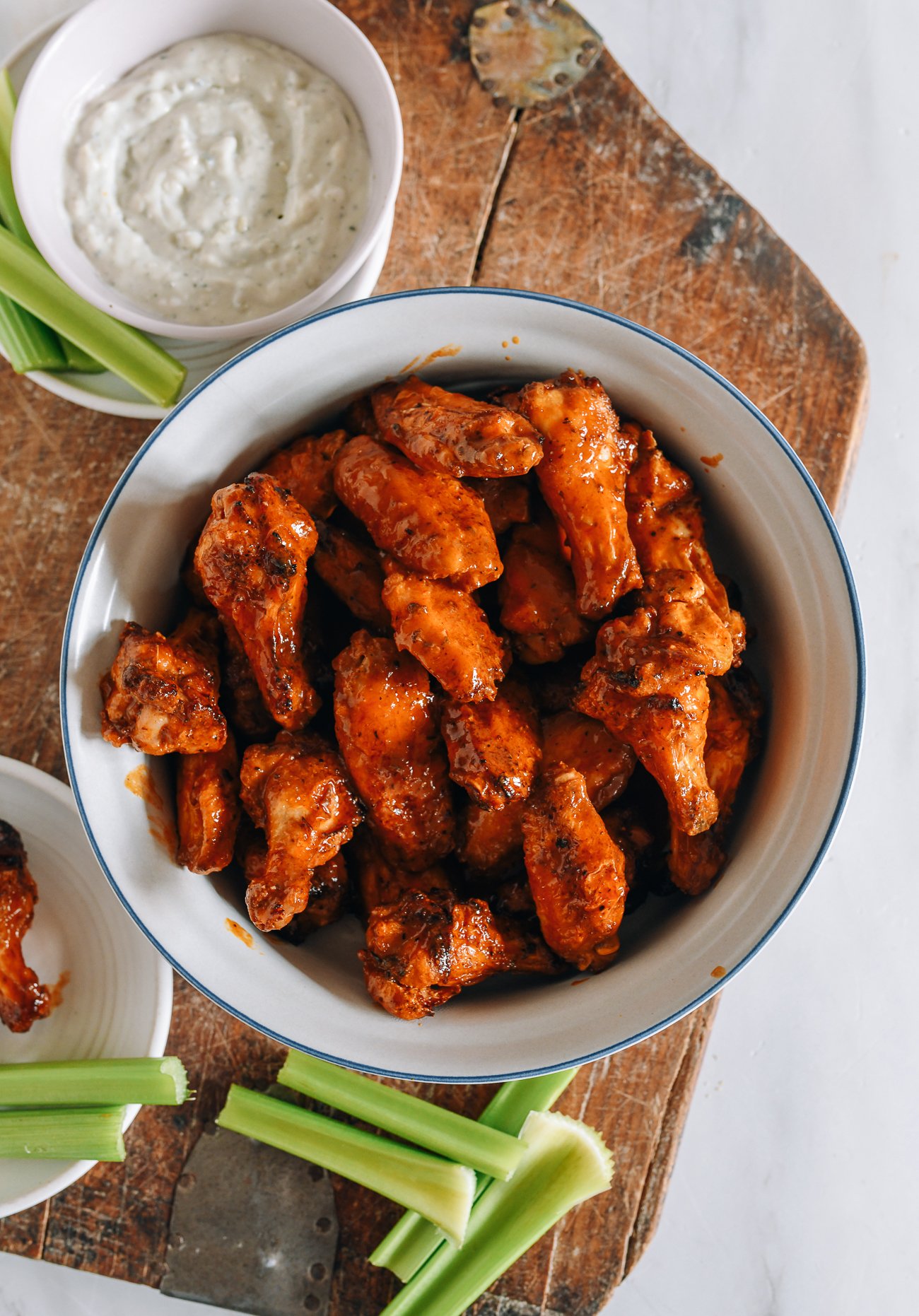 air fryer buffalo wings with blue cheese dressing and celery sticks
