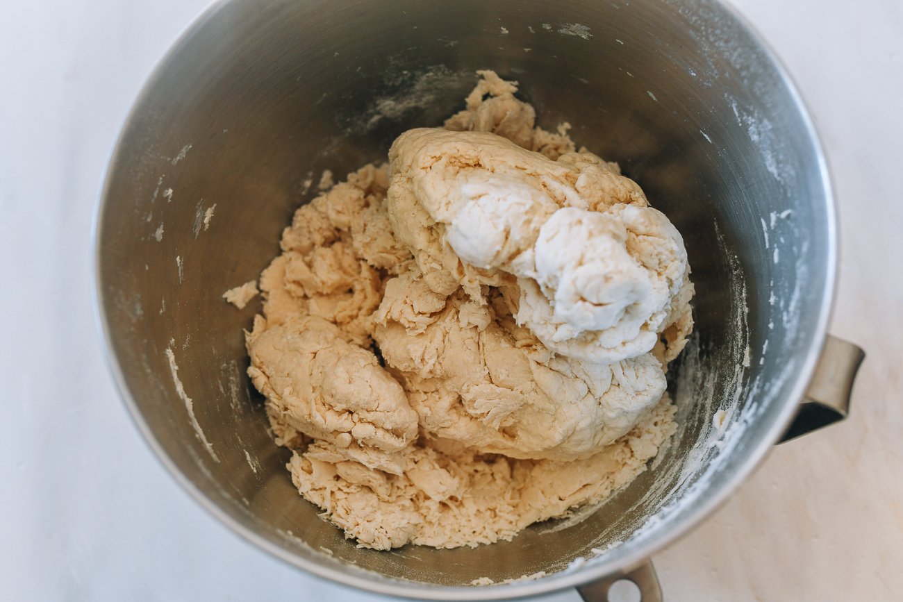 flour and water dough in bowl of stand mixer