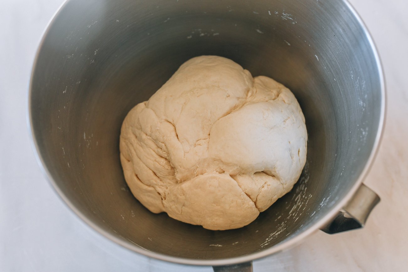 dumpling dough in metal bowl