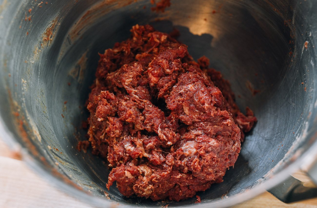 ground beef in mixing bowl