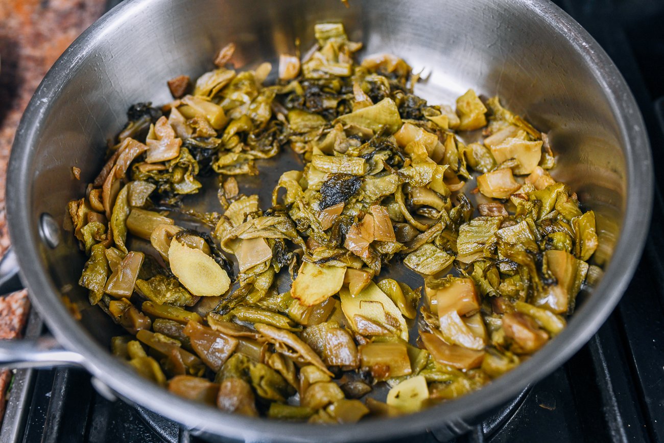 pan-fried pickled mustard greens with ginger