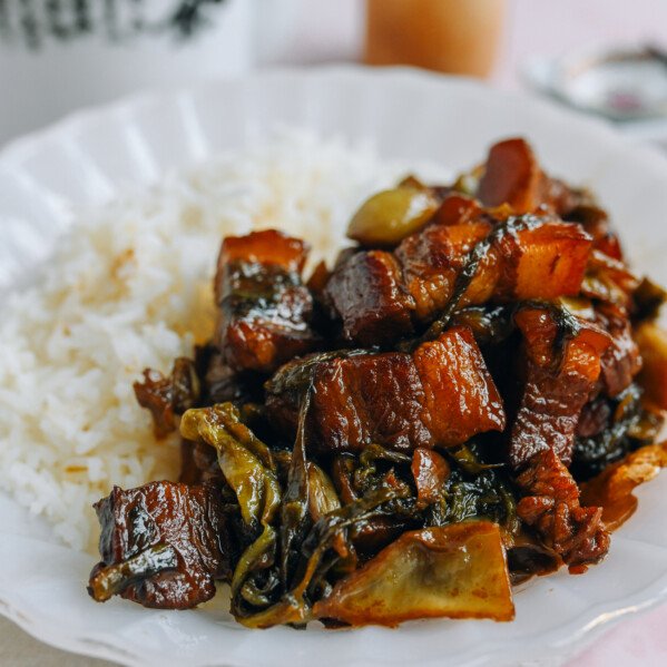 Pork belly with marinated mustard greens on rice