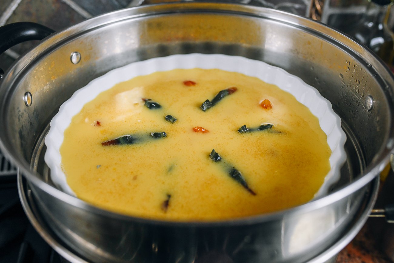 three color steamed egg in dish before steaming