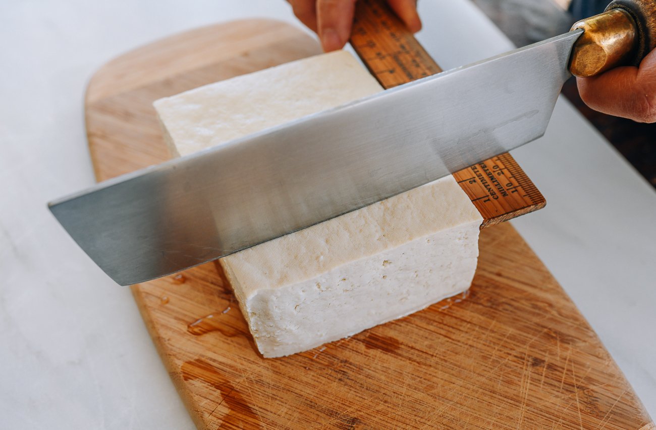 slicing block of firm tofu