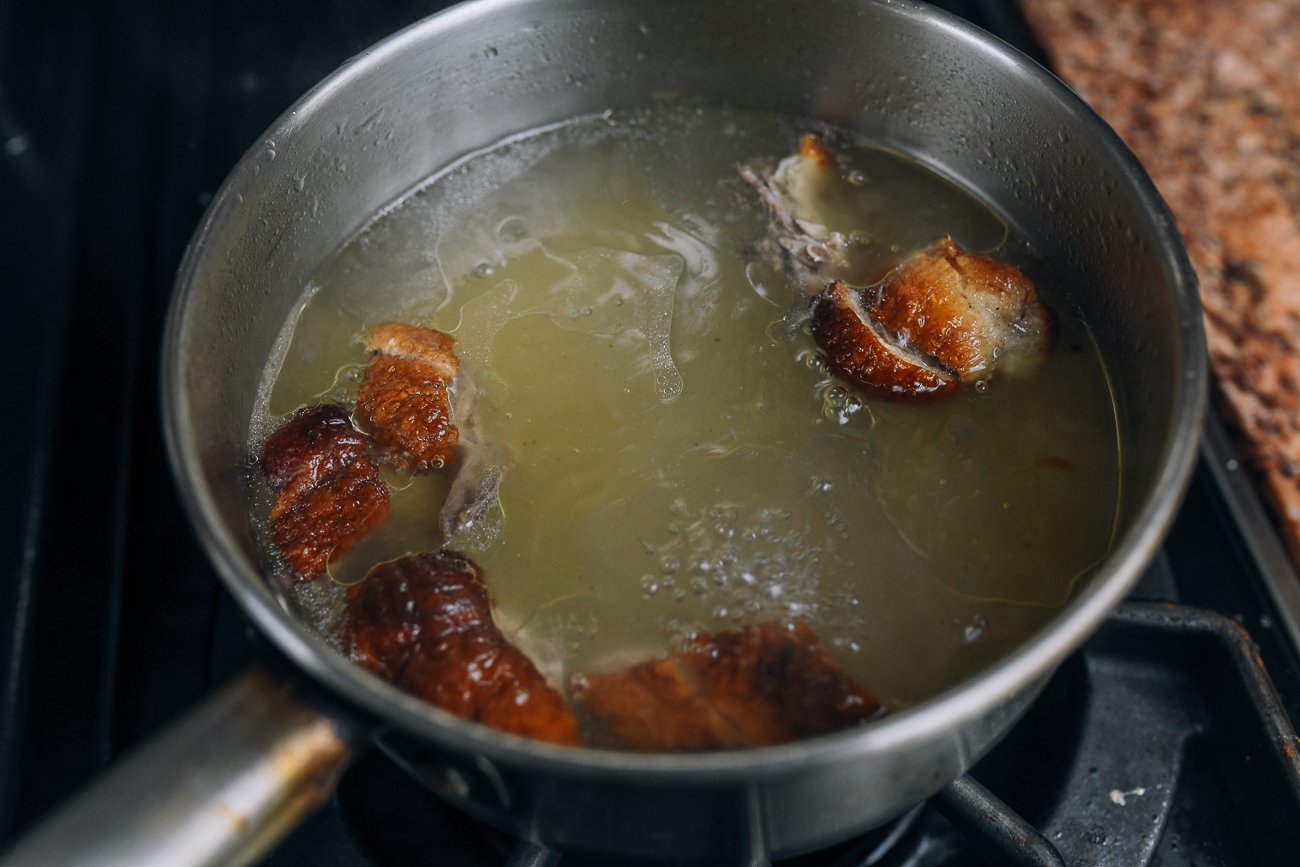 roast duck boiling in water