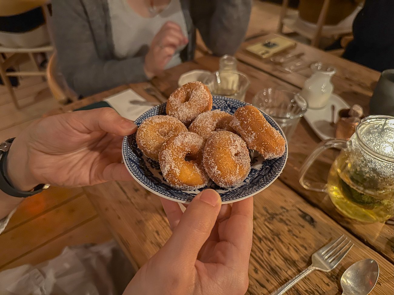 Blue plate of mini sugared donuts at The Lost Kitchen