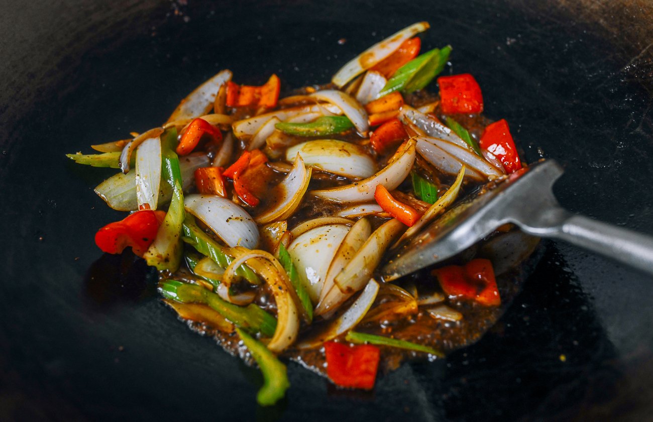 vegetables and sauce in wok
