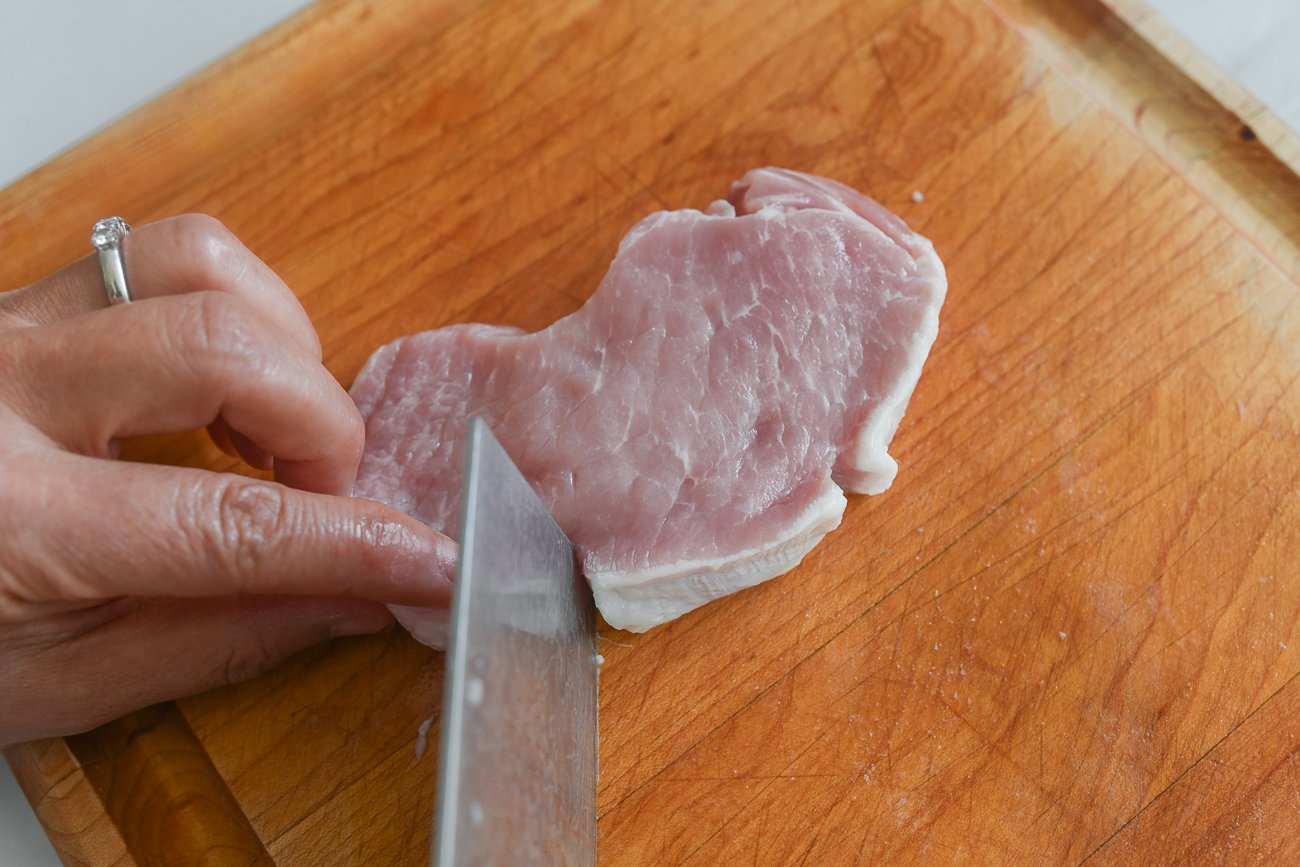cutting slits in pork chops