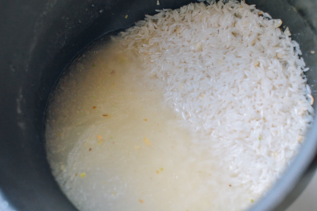 rice in rice cooker with broth