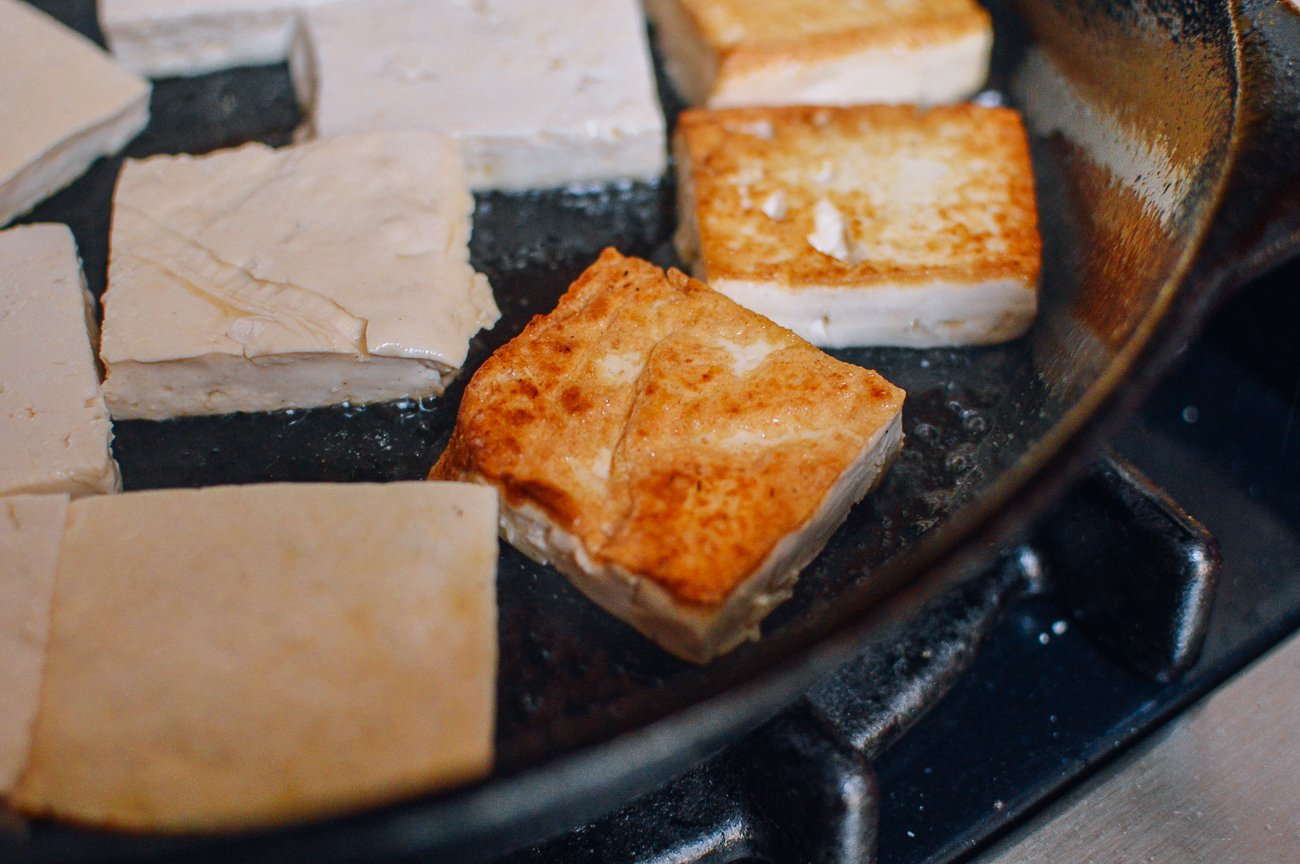 pan-frying tofu in cast iron pan