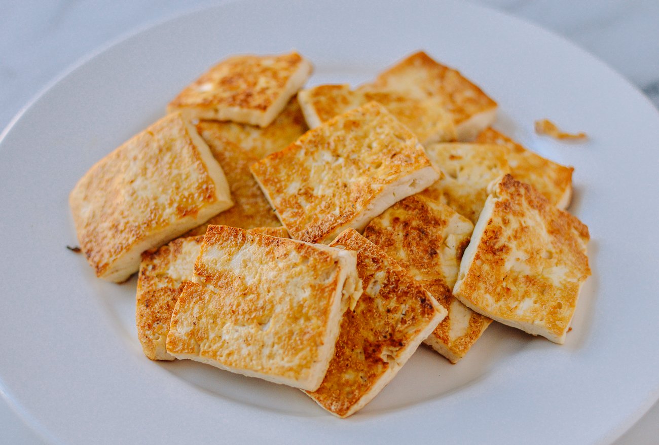 pan-fried tofu slices on plate