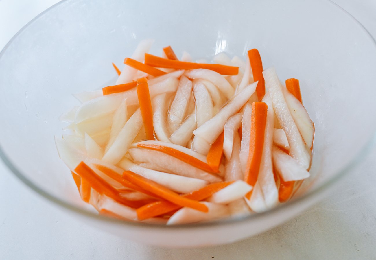 daikon and carrot in pickling liquid