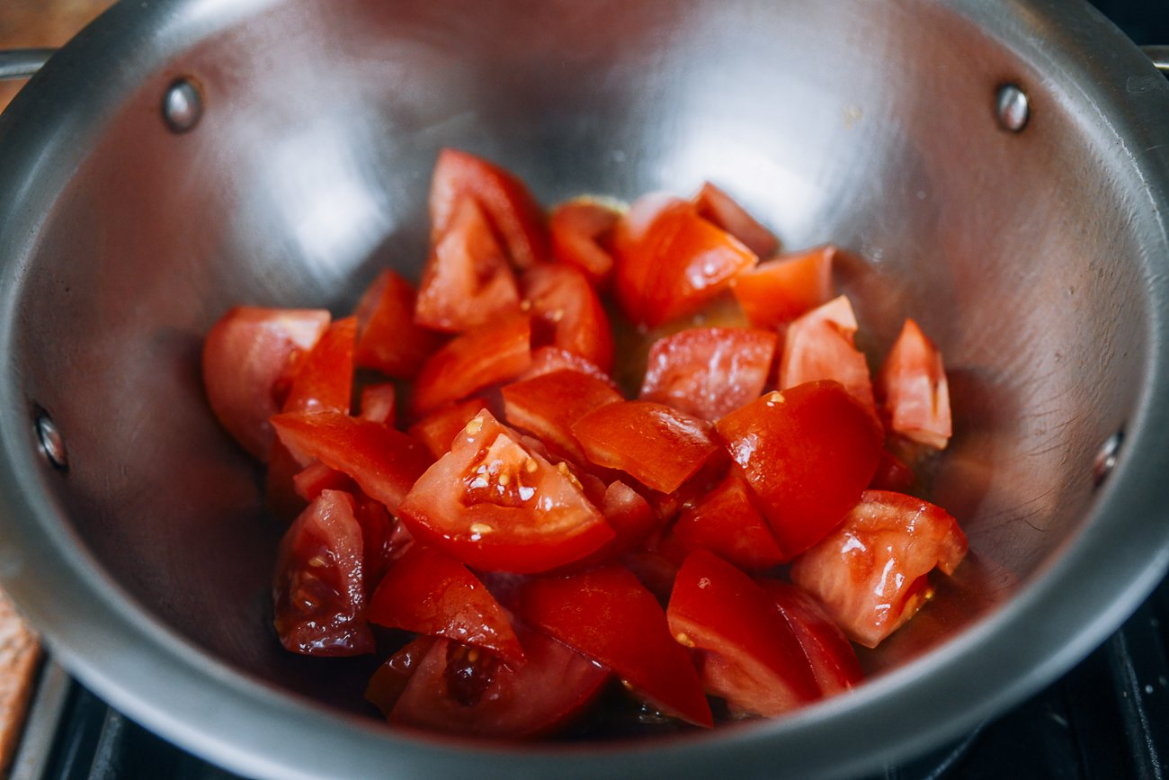 Tomato chunks in medium soup pot