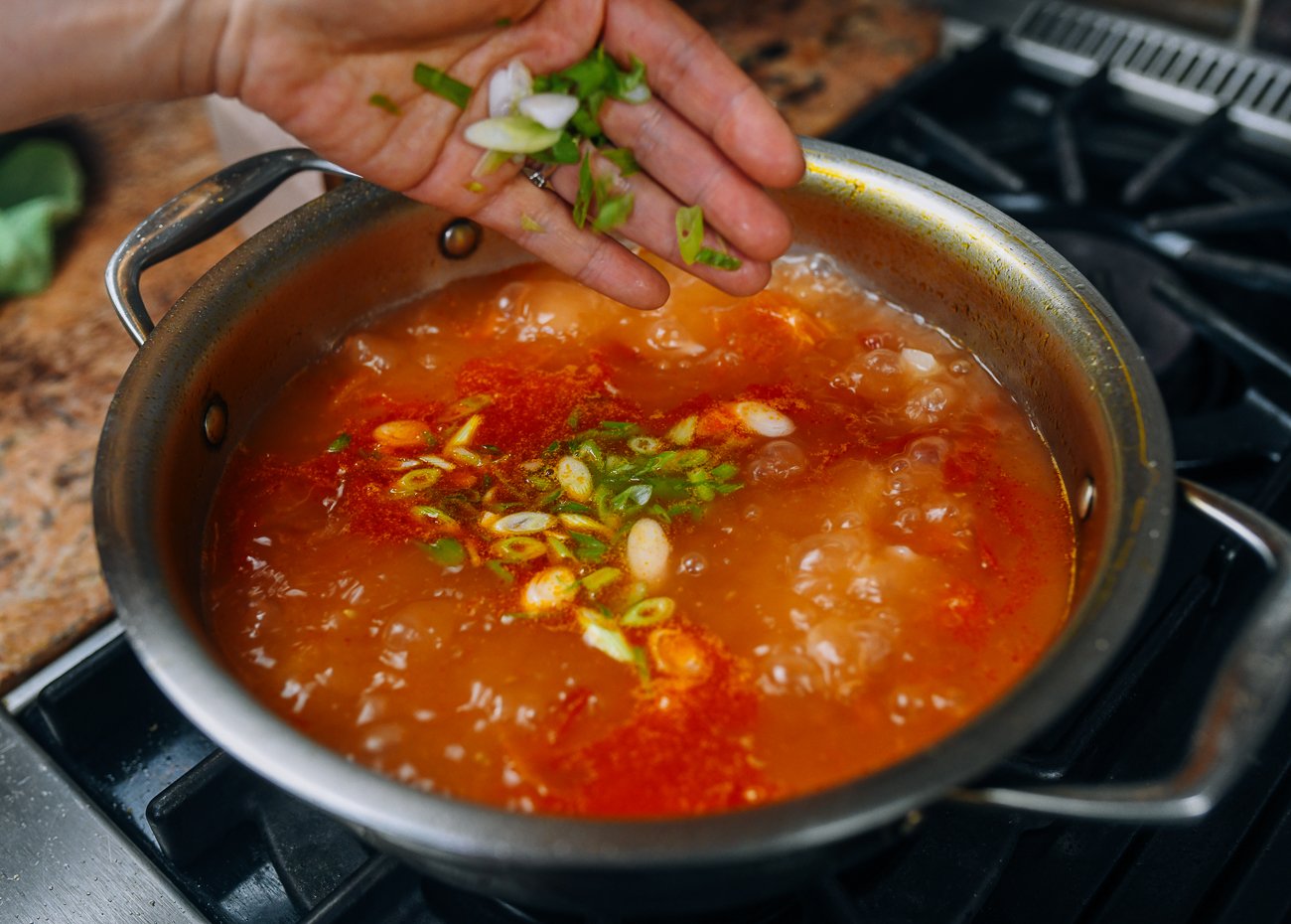 Adding scallions to tomato potato soup