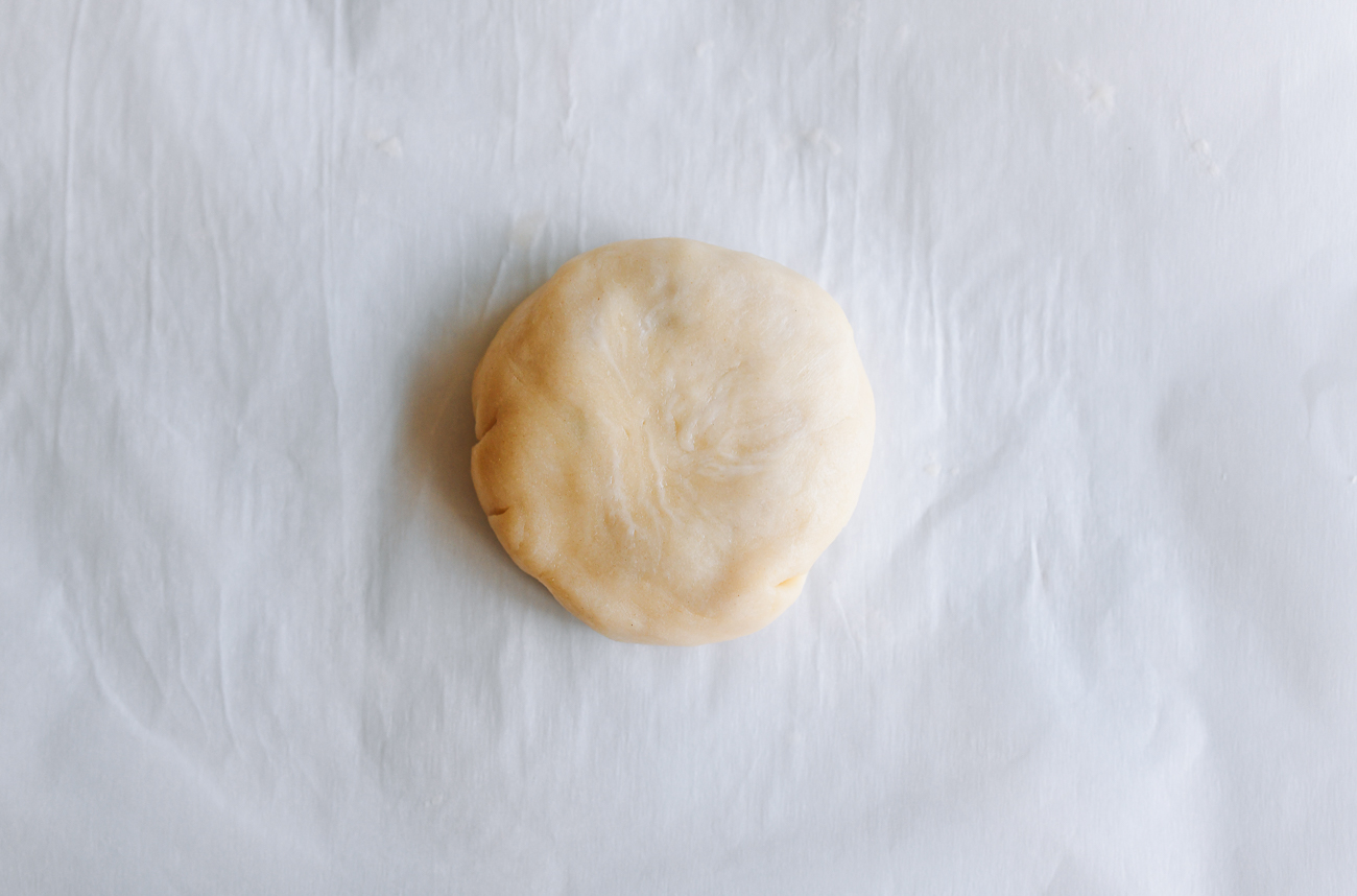flattened dough disc with winter melon filling