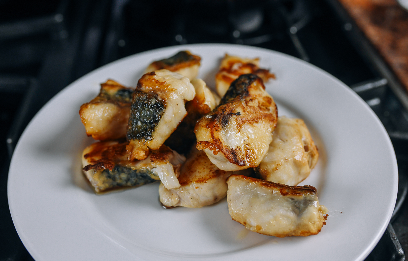 seared fish pieces on plate