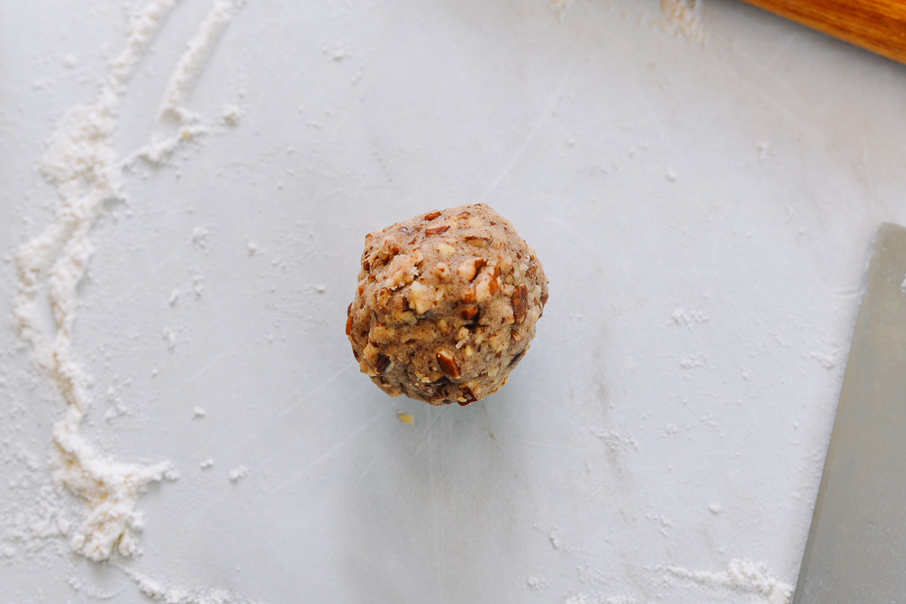 ball of pecan filling on work surface