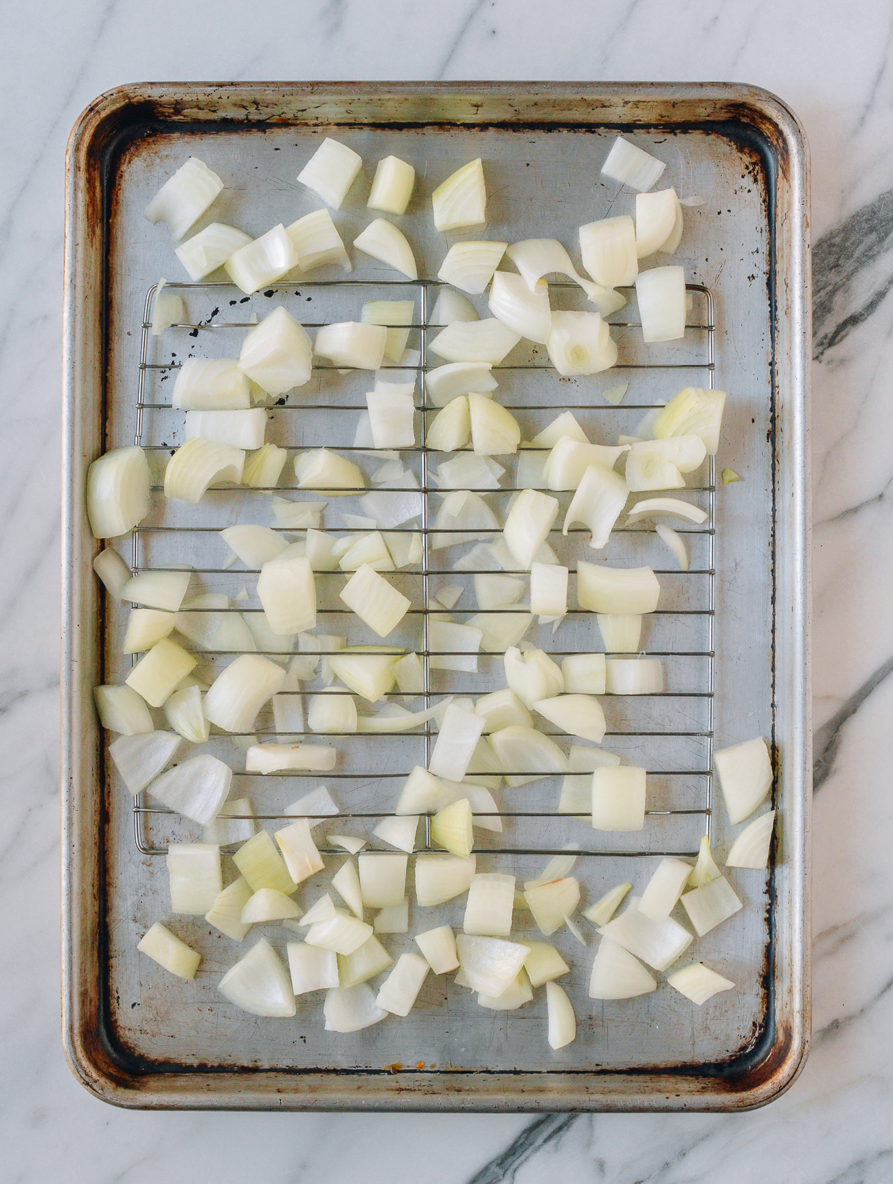 sheet pan with rack over onions